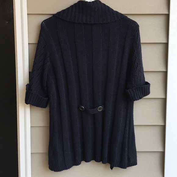 Go from winter to spring in this cute short sleeve navy blue cardigan. - Picture 5 of 8